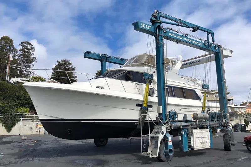 Slide: The Image of 2002 Hampton 550 yacht in Santa Cruz Harbor Boatyard lift. - 8