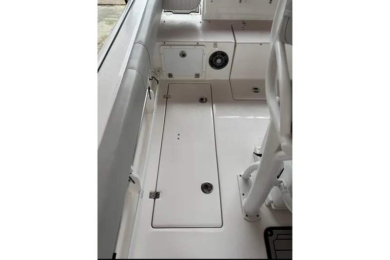 Slide: The Image of 2022 Sea Fox 268 Commander boat interior with storage compartments and seating. - 12
