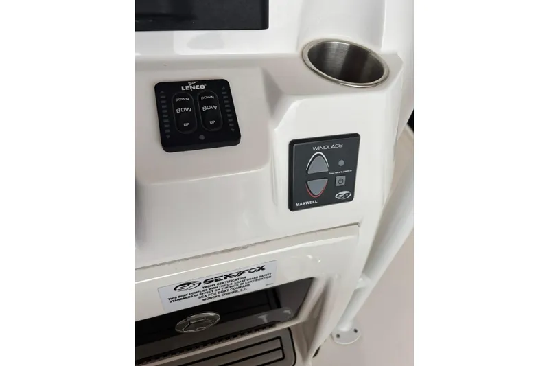 Slide: The Image of Control panel of 2022 Sea Fox 268 Commander boat with Lenco and Maxwell switches. - 22