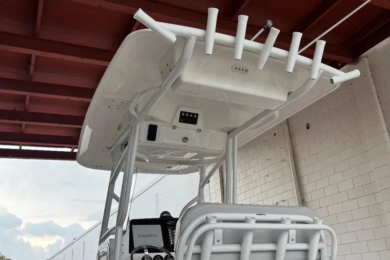 Slide: The Image of 2022 Sea Fox 268 Commander boat console with Garmin electronics under a red roof. - 8