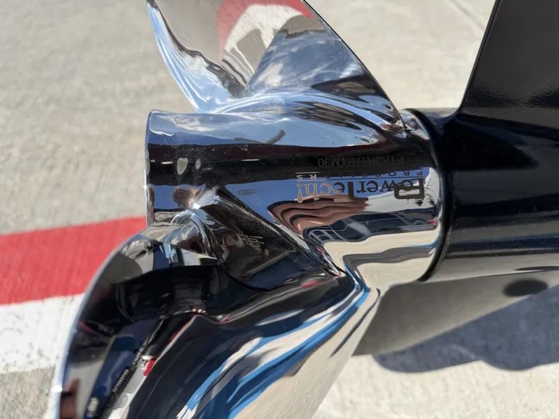 Slide: The Image of Close-up of a shiny boat propeller, Xpress H20B 2026 model. - 11