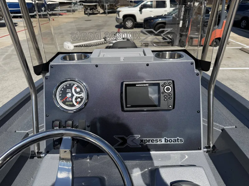 Slide: The Image of Dashboard of Xpress H20B boat, model year 2026. - 13