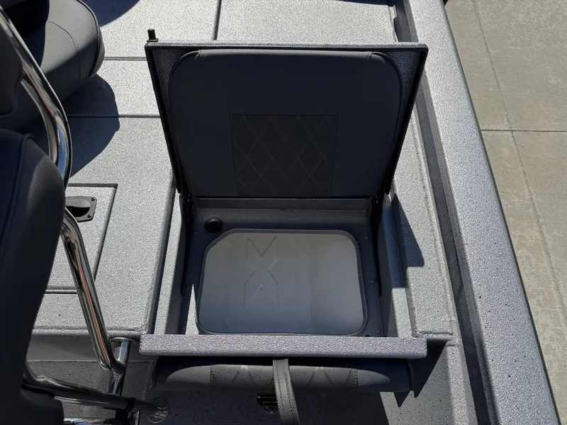 Slide: The Image of Open storage compartment in Xpress H20B boat, year 2026. - 18