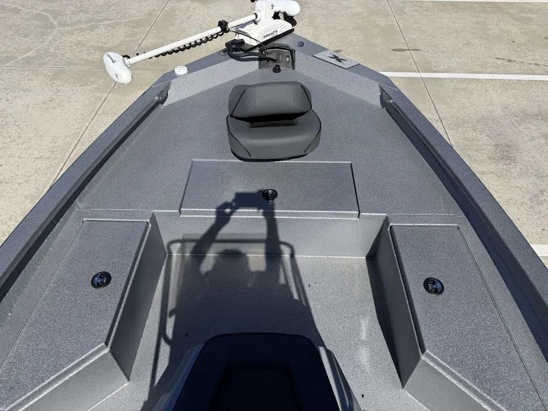 Slide: The Image of 2026 Xpress H20B boat with gray deck and seat. - 22