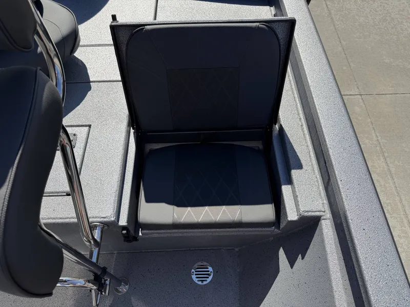 Slide: The Image of Seat on a 2026 Xpress H20B boat, gray upholstery. - 31