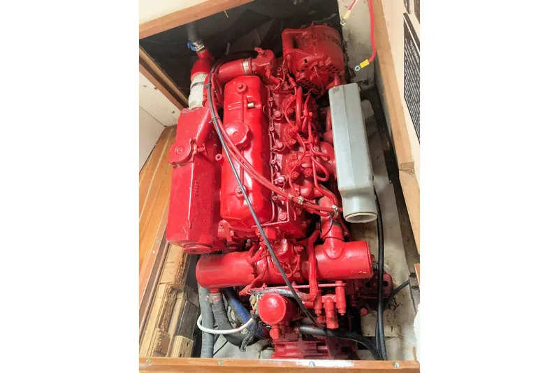 Slide: The Image of Red engine of a 1967 Columbia Constellation boat, detailed view. - 100