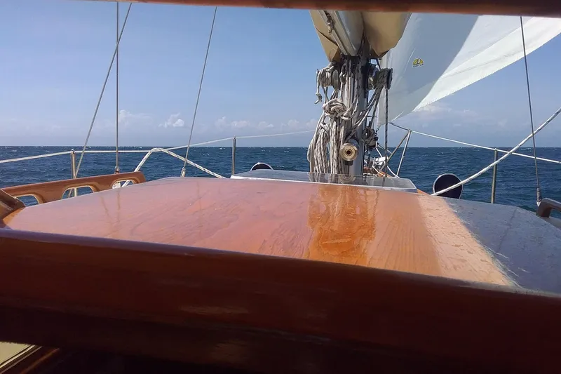 Slide: The Image of 1967 Columbia Constellation sailboat deck with ocean view and clear sky. - 41