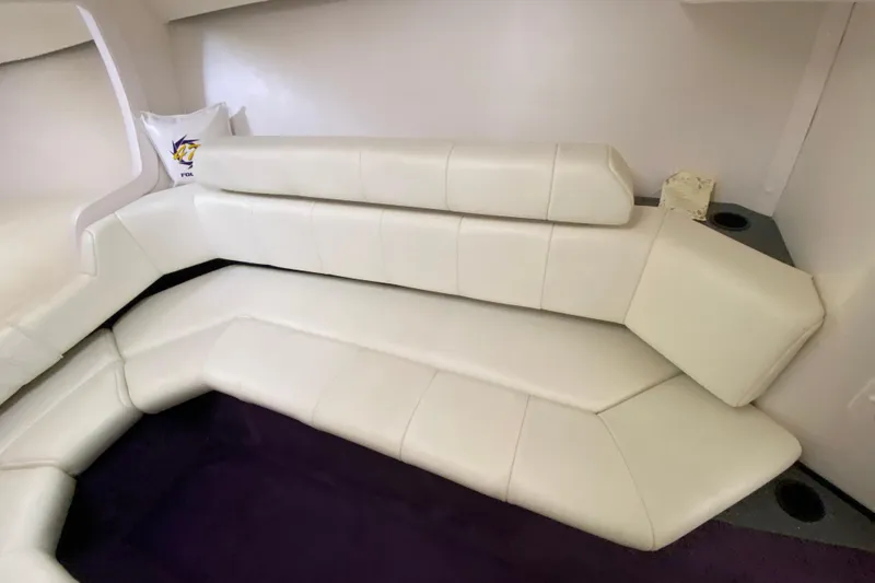 Slide: The Image of Interior of 1999 Fountain 47 Lightning boat with white leather seating. - 31