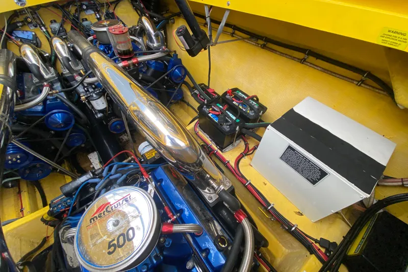Slide: The Image of Engine compartment of a 1999 Fountain 47 Lightning boat with MerCruiser components. - 40
