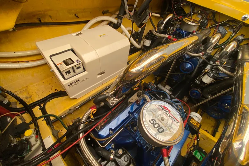 Slide: The Image of Engine room of 1999 Fountain 47 Lightning with Kohler power system and MerCruiser engine. - 41