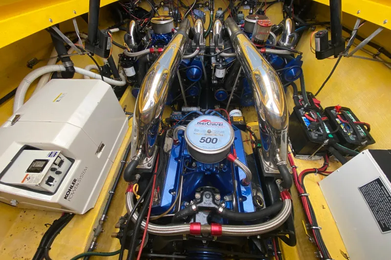 Slide: The Image of Engine compartment of a 1999 Fountain 47 Lightning boat with MerCruiser 500 engine. - 42