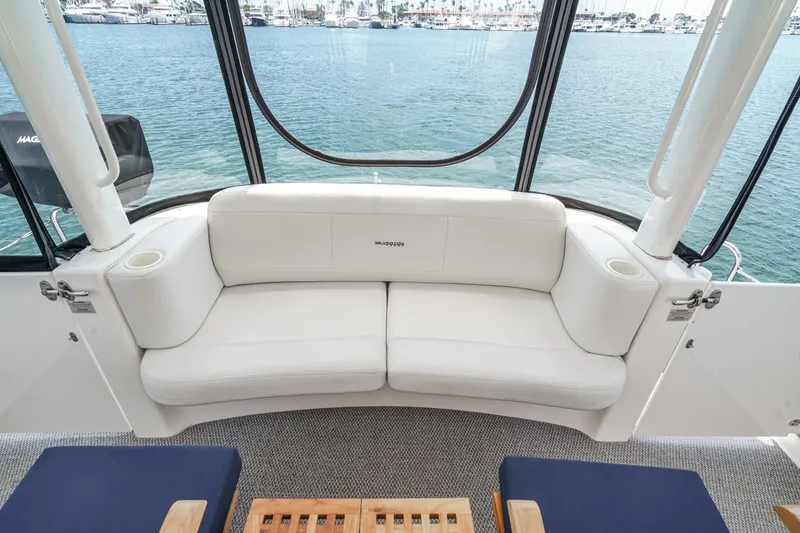 Slide: The Image of Luxurious seating area on 2004 Silverton 39 Motor Yacht with ocean view. - 10
