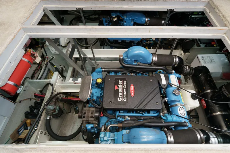 Slide: The Image of Engine room of a 2004 Silverton 39 Motor Yacht, featuring Crusader engines. - 37