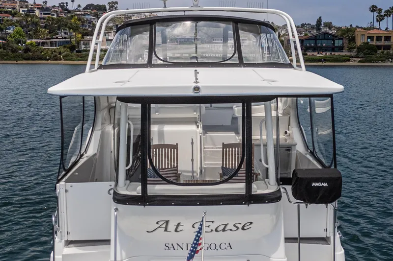 Slide: The Image of 2004 Silverton 39 Motor Yacht docked in San Diego, rear view. - 7