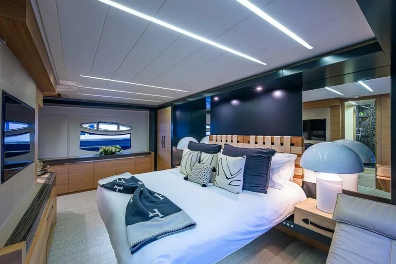 Slide: The Image of Luxurious bedroom interior of 2014 Pershing 92 yacht with modern design and elegant decor. - 13