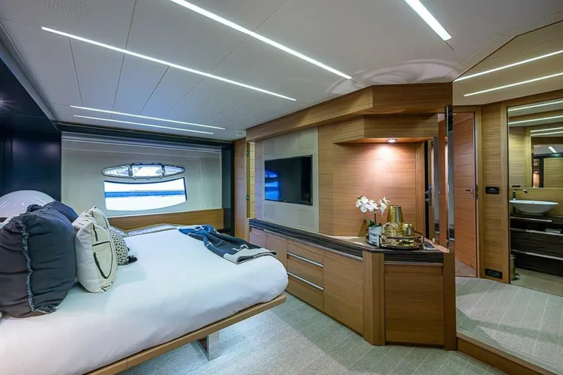 Slide: The Image of Luxurious bedroom interior of 2014 Pershing 92 yacht with modern design and elegant decor. - 16