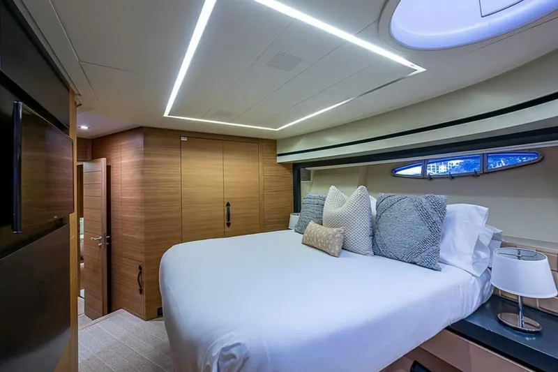 Slide: The Image of Luxurious bedroom interior of 2014 Pershing 92 yacht with modern design and elegant lighting. - 18