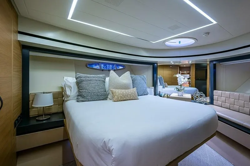 Slide: The Image of Luxurious bedroom interior of 2014 Pershing 92 yacht with modern decor and ambient lighting. - 19