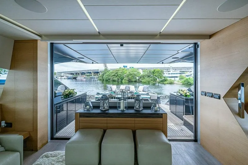 Slide: The Image of Luxurious interior of 2014 Pershing 92 yacht with open deck view. - 7