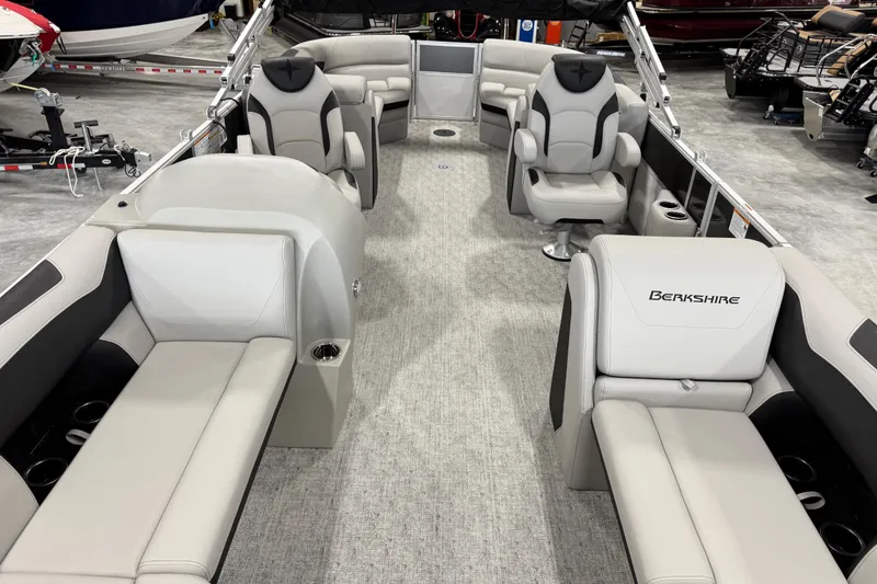 Slide: The Image of Interior of 2026 Berkshire 24RFX LE pontoon boat with luxurious seating and modern design. - 12
