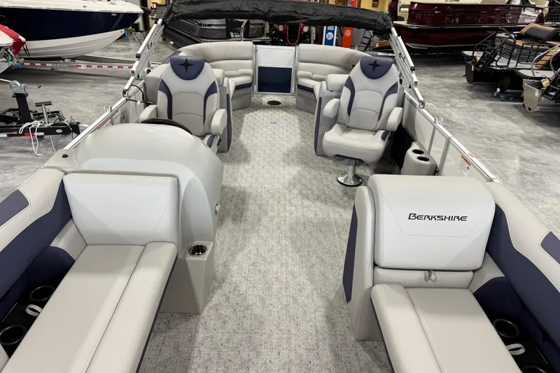 Slide: The Image of 2026 Berkshire 24RFX LE pontoon boat interior with luxurious seating and modern design. - 5