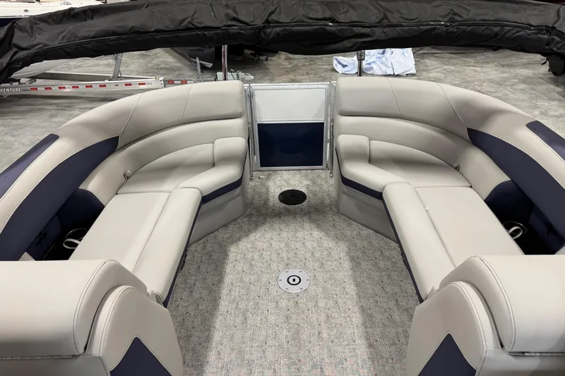 Slide: The Image of 2026 Berkshire 24RFX LE boat interior with plush seating and modern design. - 7