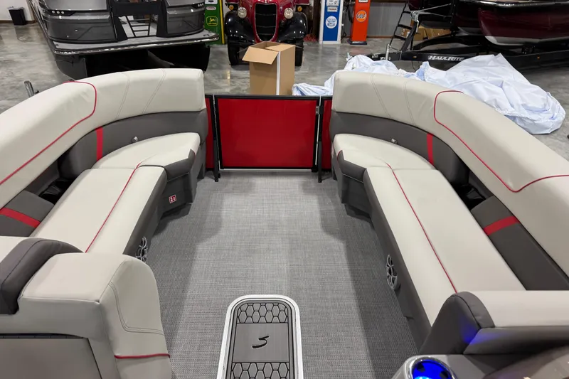 Slide: The Image of Interior of 2026 Sylvan X-5 boat with modern seating and sleek design. - 8