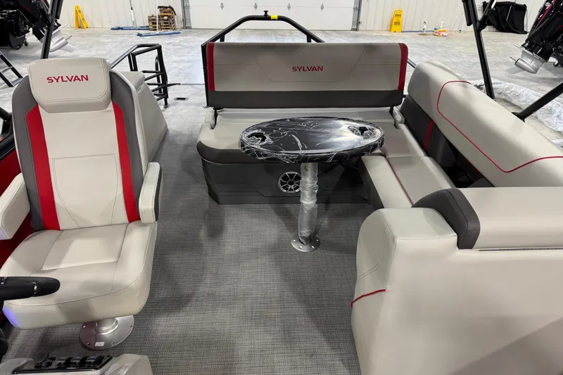 Slide: The Image of Interior of 2026 Sylvan X-5 boat with modern seating and table. - 9