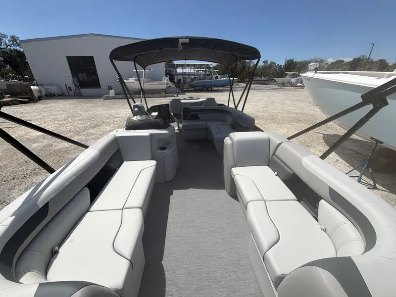 Slide: The Image of Interior view of Sweetwater 2286 FS pontoon boat, model year 2026. - 16