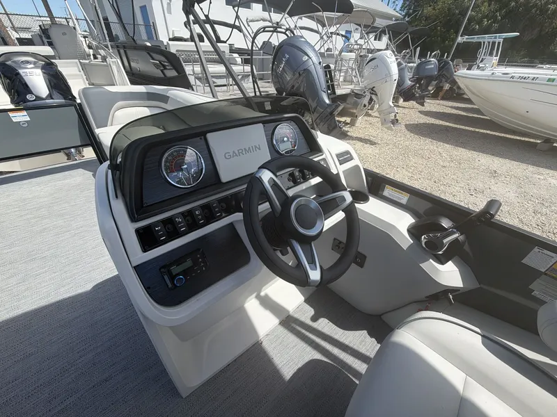Slide: The Image of Interior view of Sweetwater 2286 FS 2026 with Garmin controls. - 18
