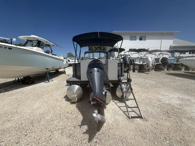 Slide: The Image of 2026 Sweetwater 2286 FS boat at a marina. - 6