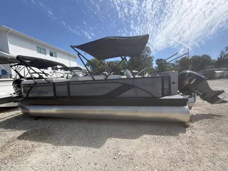 Slide: The Image of 2026 Sweetwater 2286 FS pontoon boat with Yamaha motor outdoors. - 8