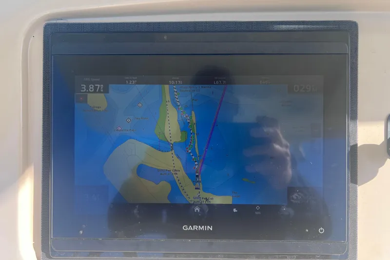 Slide: The Image of Garmin GPS display on 2015 Scout 255 LXF boat showing navigation map. - 24