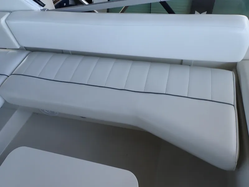 Slide: The Image of White seating on 1996 Carver 370 Voyager boat, featuring sleek, cushioned design. - 41