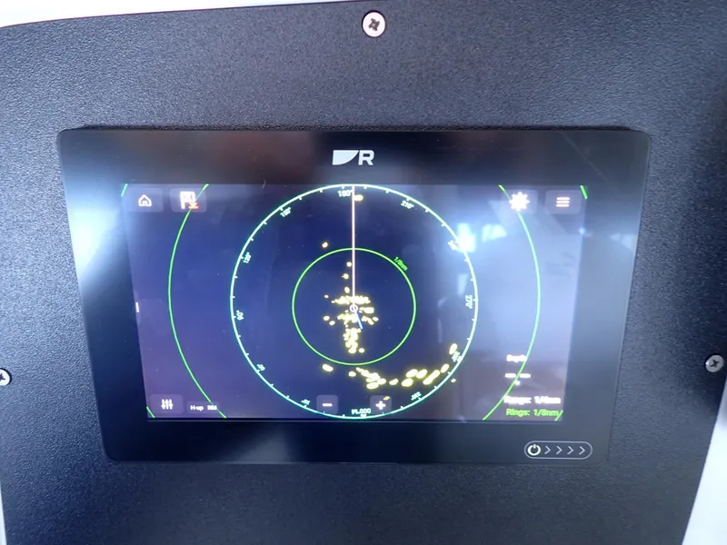 Slide: The Image of Radar display on 1996 Carver 370 Voyager boat, showing navigation data. - 23