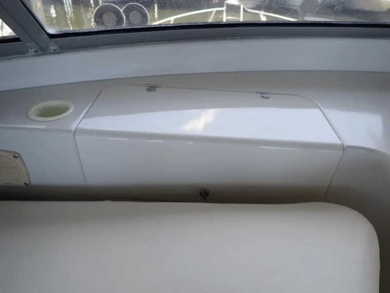 Slide: The Image of Interior view of a 1996 Carver 370 Voyager boat, featuring a sleek dashboard design. - 39