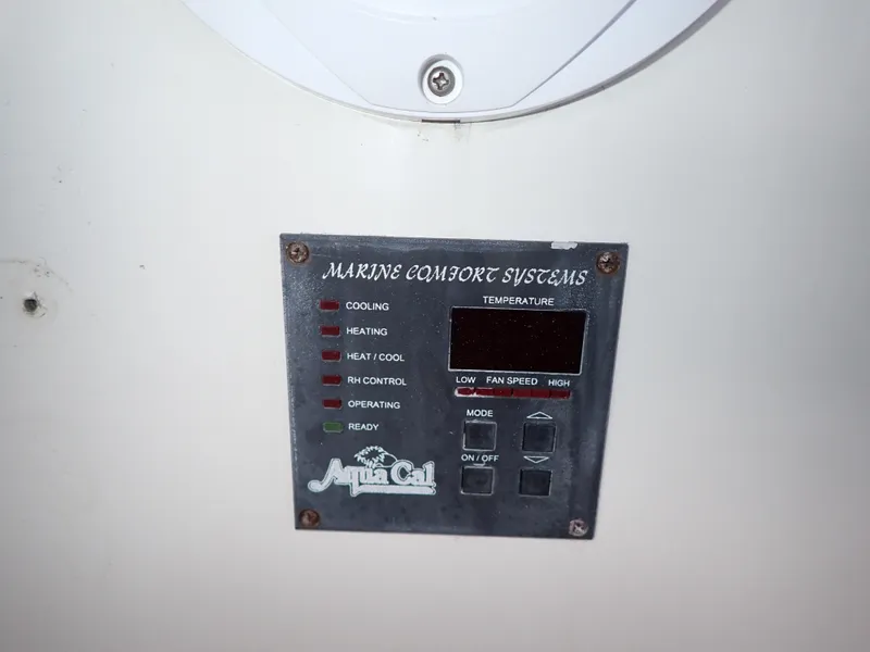 Slide: The Image of Marine Comfort Systems control panel on 1996 Carver 370 Voyager boat. - 46