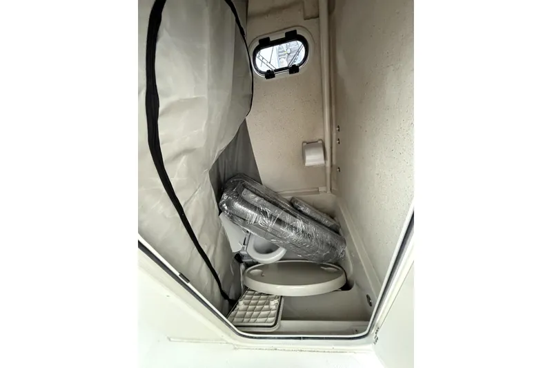 Slide: The Image of Interior cabin of 2026 Sea Chaser 30 HFC CC boat with compact toilet. - 9