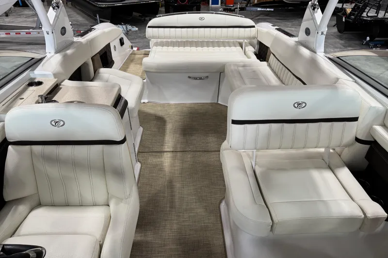 Slide: The Image of 2017 Cobalt A28 boat interior with luxurious white seating and spacious layout. - 6
