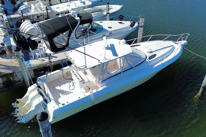 Slide: The Image of 2001 Intrepid 377 Walkaround boat docked at marina, aerial view. - 49