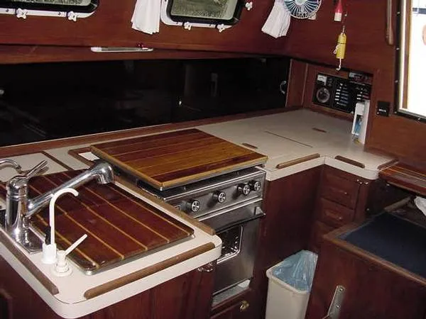 Slide: The Image of Allmand Tri-Cabin Aft Cockpit 1984 - 1