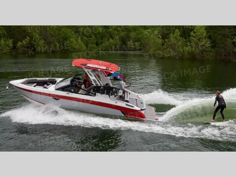 Slide: The Image of 2026 R Series R6 boat engaged in watersports on a lake. - 3