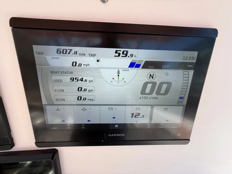 Slide: The Image of Garmin display on Intrepid 356 boat, showing trip and fuel data. - 12