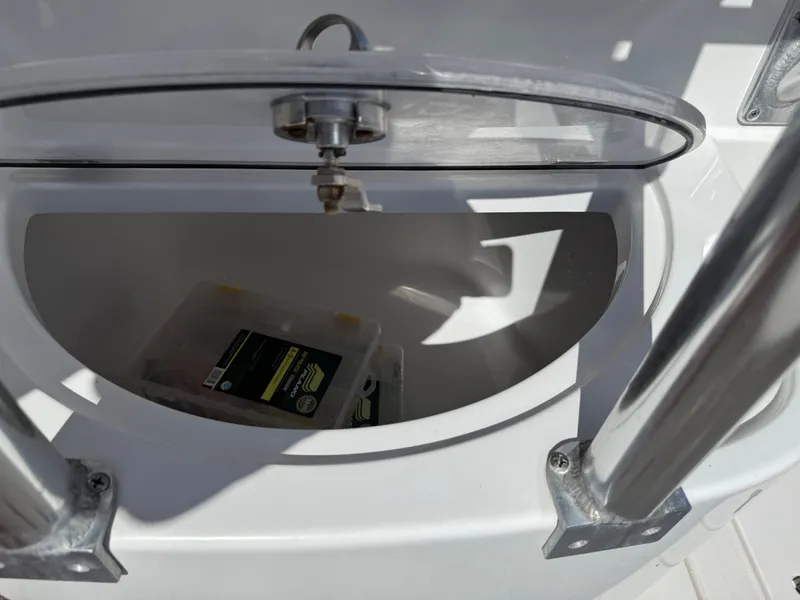 Slide: The Image of Intrepid 356 boat hatch with storage compartment, year 2000. - 19