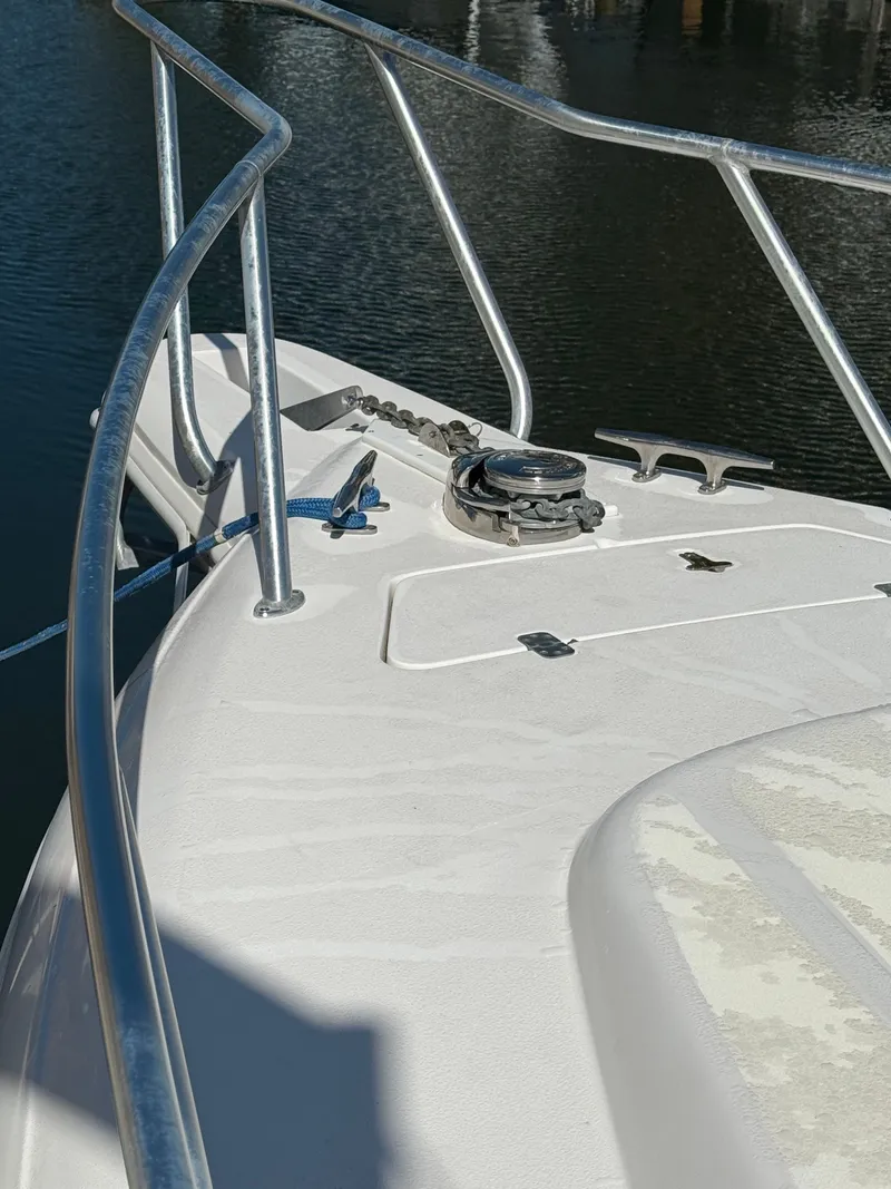 Slide: The Image of Bow of a 2000 Intrepid 356 boat with anchor windlass. - 22
