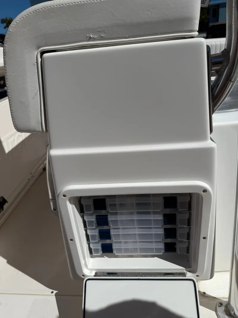 Slide: The Image of Intrepid 356 boat, 2000, featuring storage and seating area. - 23