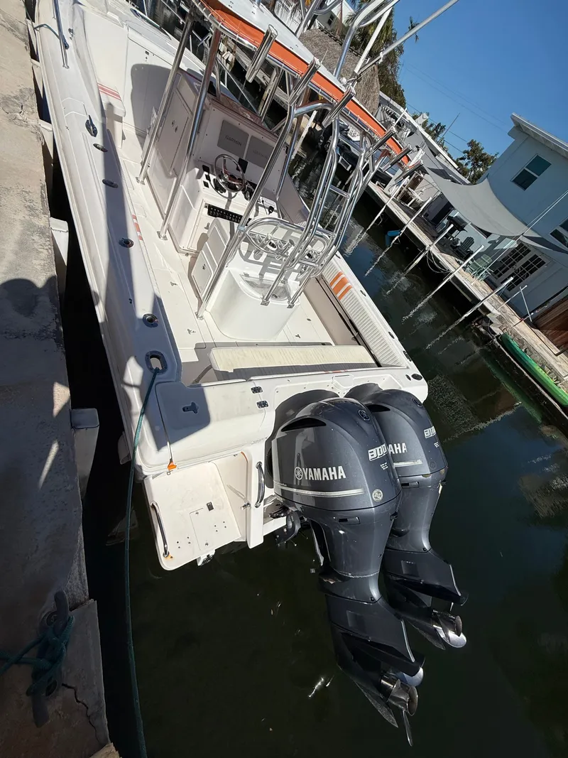 Slide: The Image of 2000 Intrepid 356 boat with Yamaha engines docked. - 5