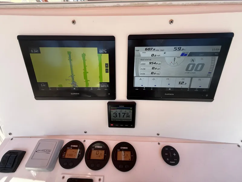 Slide: The Image of Boat dashboard with Garmin displays, Intrepid 356, year 2000. - 9