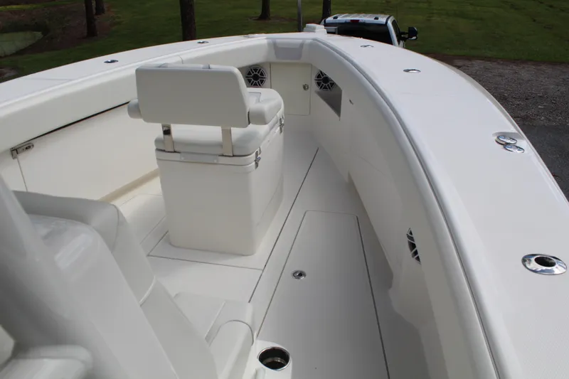 Slide: The Image of 2022 SeaVee 370Z boat interior with white seating and deck, showcasing modern design. - 19