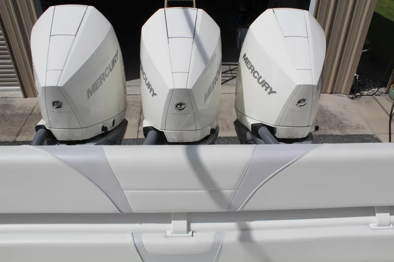 Slide: The Image of Triple Mercury outboard engines on a 2022 SeaVee 370Z boat. - 27